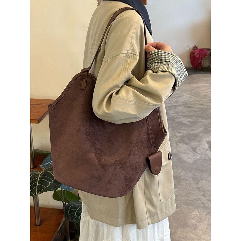Koreanische Version Retro Wildleder Eimerbeutel mit großem Fassungsvermögen neue Entspannung Schultertasche Nische vielseitige Pendler Tragetasche