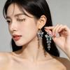 Silver Needle Crystal Beaded Butterfly Tassel Earrings - Elegant, Retro, and Fashionable Niche Jewelry for Women.