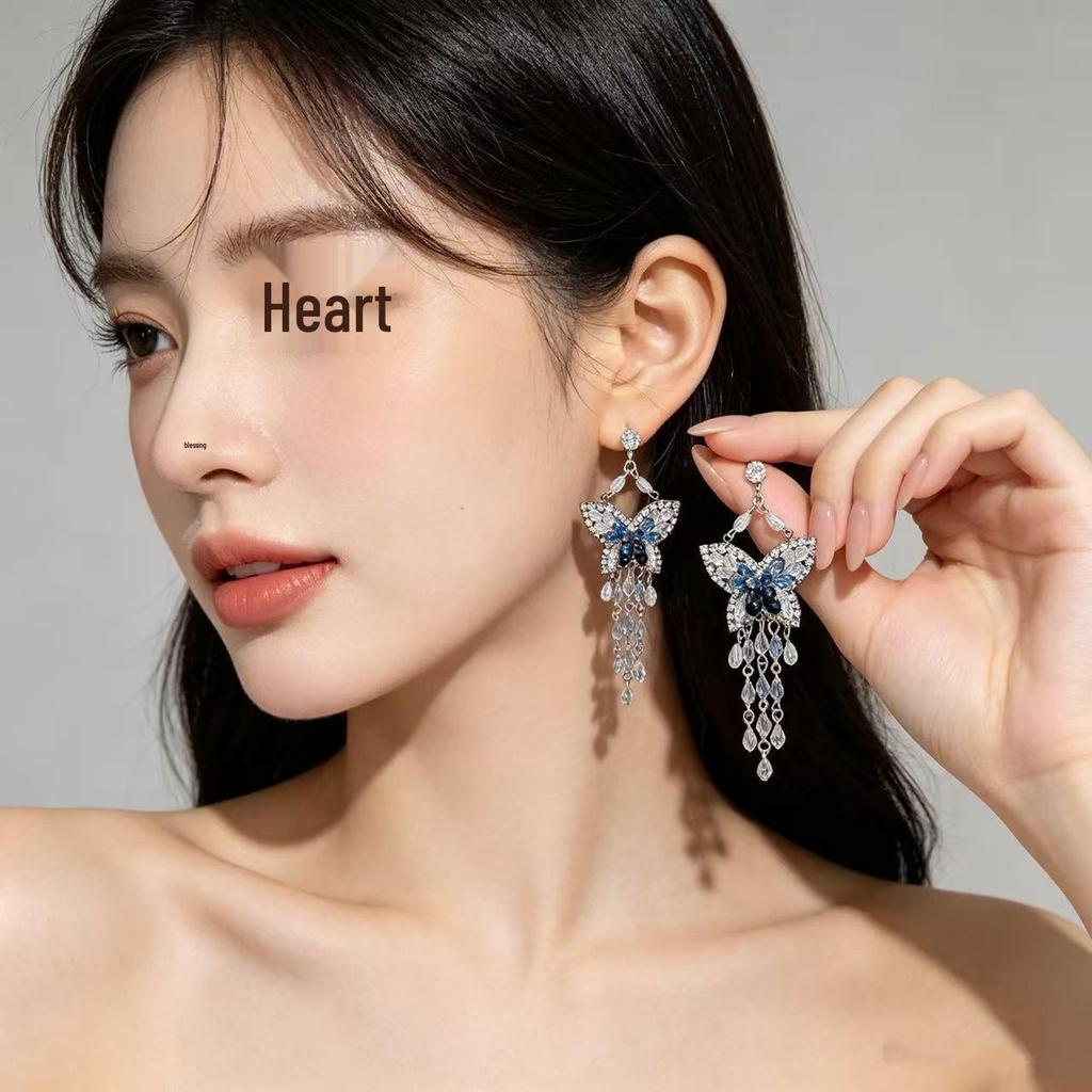 Silver Needle Crystal Beaded Butterfly Tassel Earrings - Elegant, Retro, and Fashionable Niche Jewelry for Women.