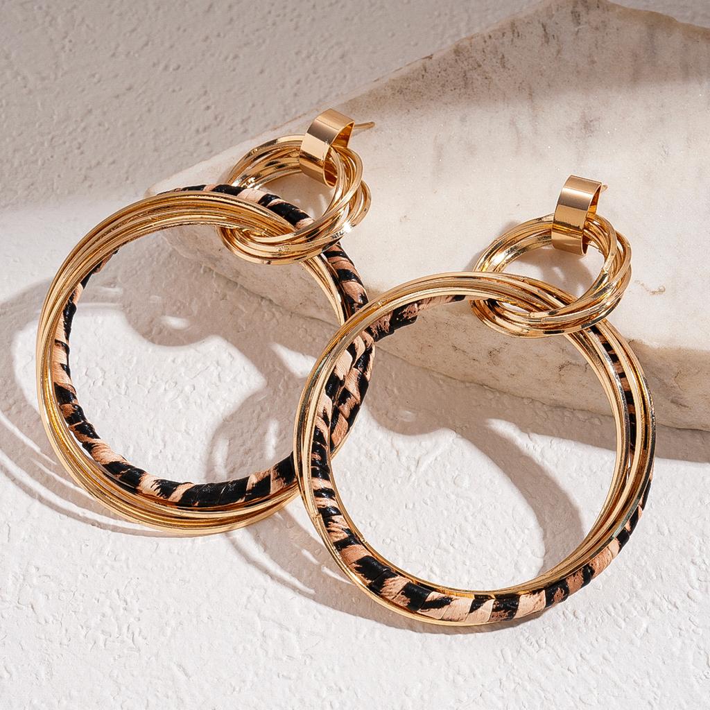 European and American retro leather leopard print multi-layer geometric round silver needle earrings niche earrings
