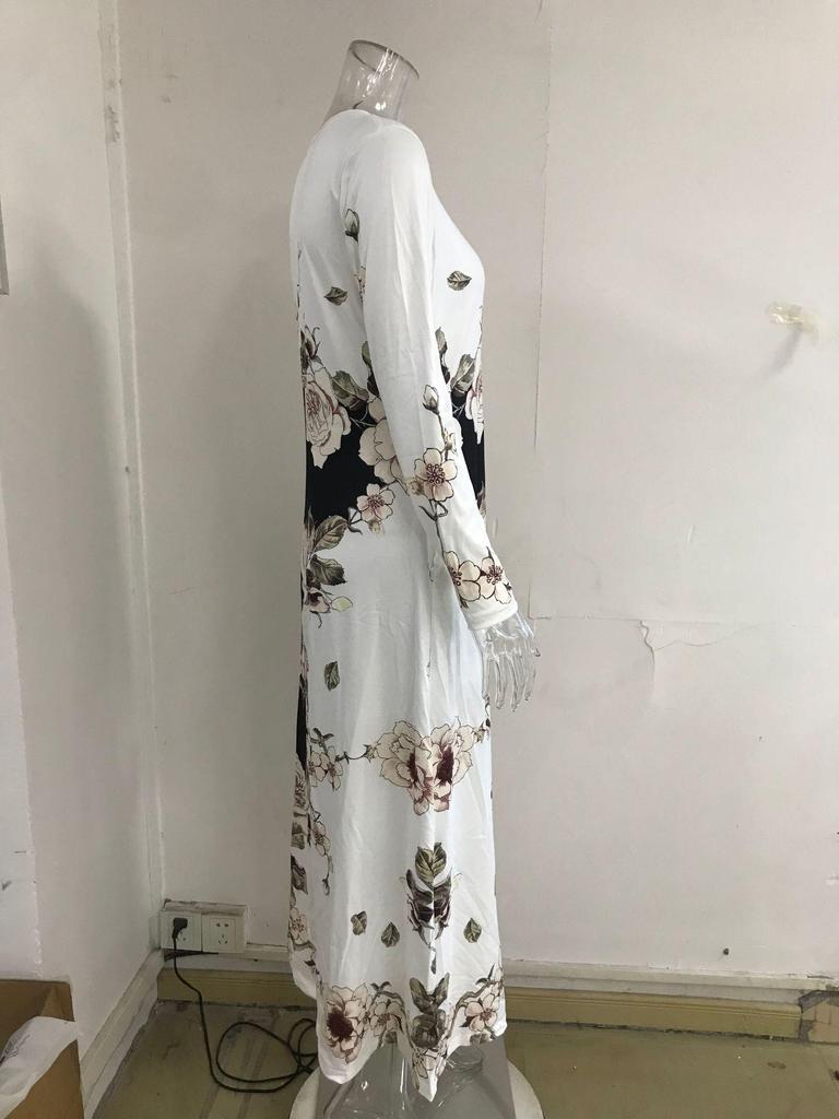 Elegant Plus Size Long Sleeve Printed Dress with Pockets and High Waist Hem