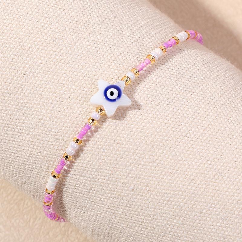 Bracelet en perles d'œil du diable tissé à la main avec motif de niche en verre