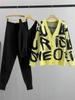 Women's Autumn/Winter Casual Knit Three-Piece Set: Cardigan, Vest, and Pants with Loose-Fit Letter Design.