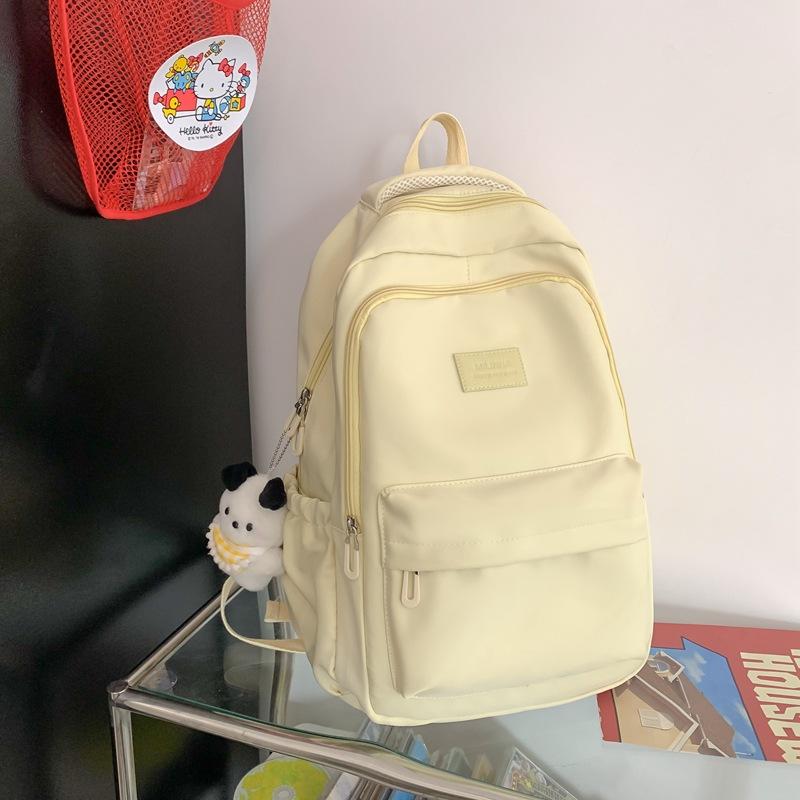 Solid color female Harajuku backpack, campus style, junior high school, high school student schoolbag, female simple large-capacity backpack