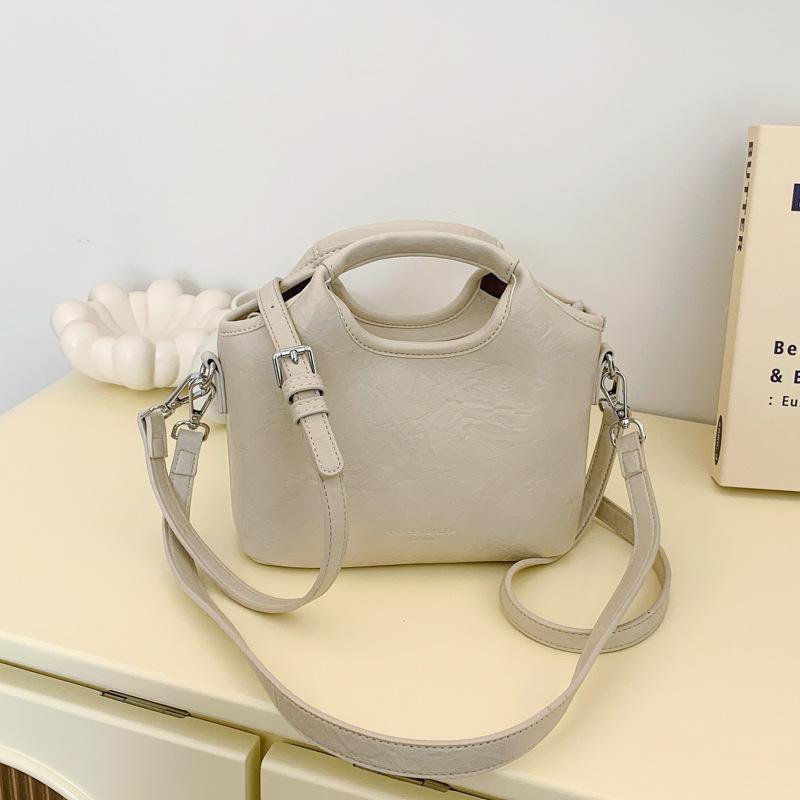 

Весна новая портативная сумка-ведро сумка женская мода повседневная личность сумка на плечо универсальная трендовая сумка-мессенджер покинуть белый