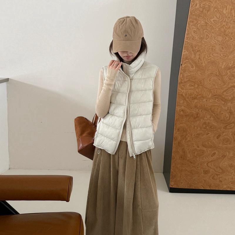 Autumn and winter ribs vest sleeveless vest down cotton light and loose Korean version warm women's black rice white