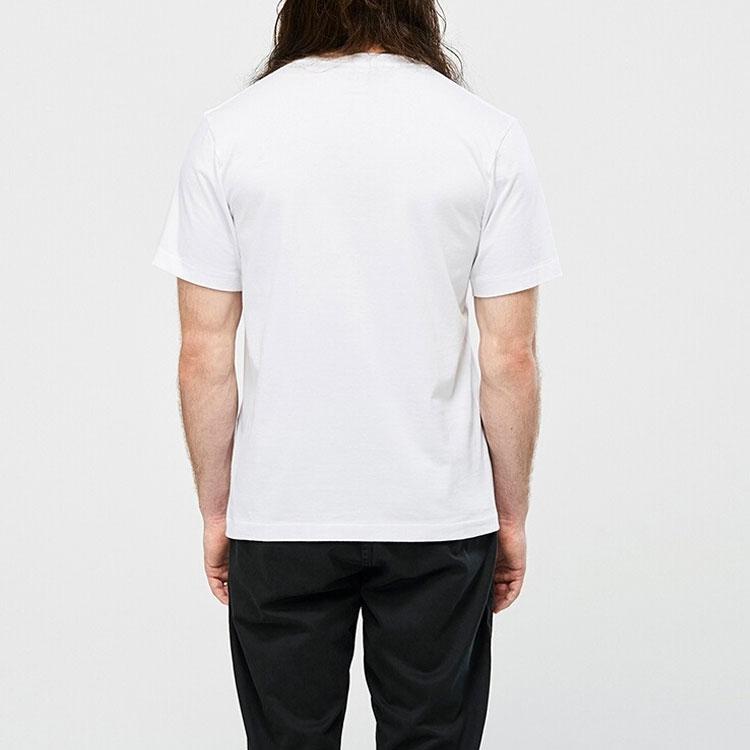 Uniqlo T-shirt a maniche corte con stampa bambola rosa collaborazione Kaws Unisex Top Bianco UQ422017000
