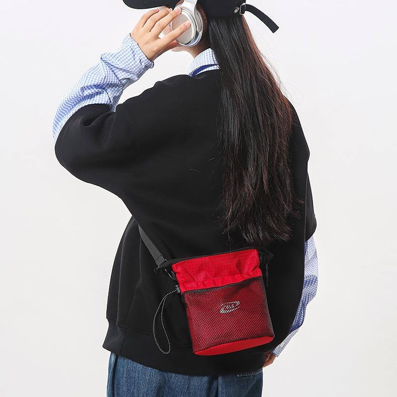 Casual messenger bag new fashion versatile commuter sports bucket shoulder bag women's mobile phone bag