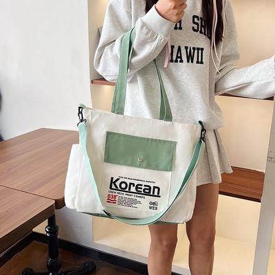 Borsa da mano in tela da donna stile semplice Nuova borsa a tracolla messenger versatile alla moda Borsa da ascella per studenti pendolari di grande capacità