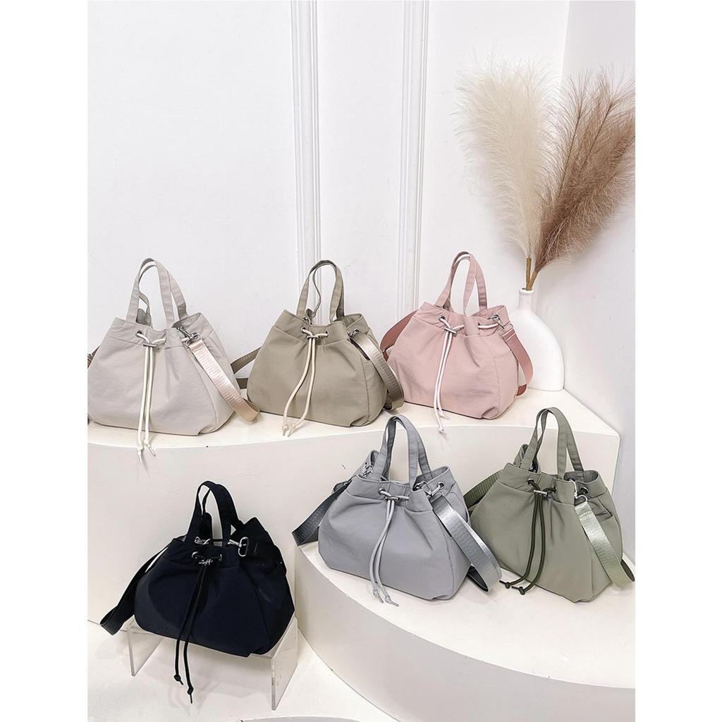 Casual Niche Drawstring Hand-held Bucket Bag Crossbody Bag for Women 2026 New Trendy Versatile Simple Small Bag Cloth Bag