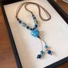 JMXD-Creative Retro Ethnic Style Hand-woven Long Sweater Chain Literary and Versatile Ceramic Love Necklace Accessories