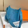 TC vrchní vrstva hovězí kůže voskovaná nit vysoká kvalita Evelyn 29 dutá ramenní crossbody dámská taška lychee vzor měkká kožená taška typu bucket