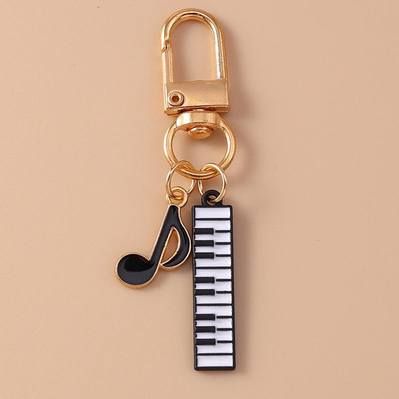 Niedlicher Emaille Mini-Klavier Schlüsselanhänger Simulation Musikinstrumente Schlüsselring Anhänger Damen Mädchen Handtaschen Dekoration DIY Schmuck Geschenk