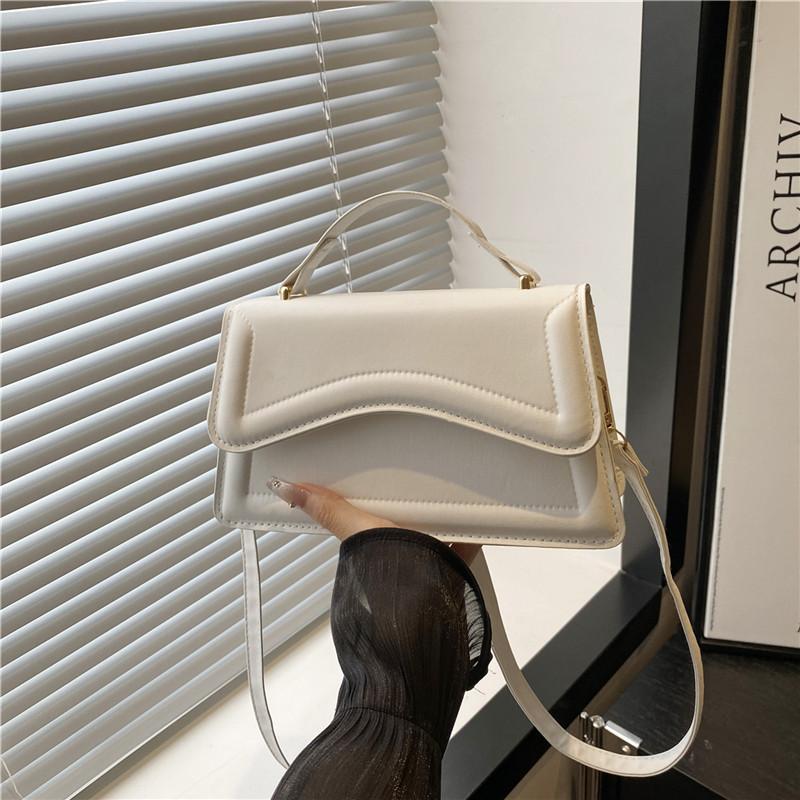 

Summer new fashion simple indentation design casual popular simple shoulder portable oblique span women s bag small