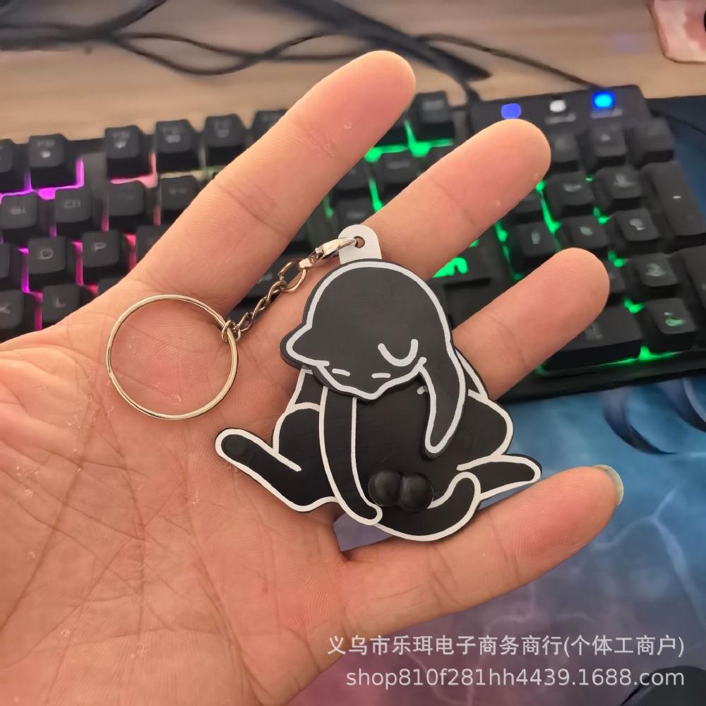 Creative Pull-Apart Cat Keychain - Cute Rotating Toy for Backpack and Bag Decoration