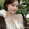 Holiday style French polka dot suspender dress women's summer lotus leaf edge super fairy skirt slim waist word long dress