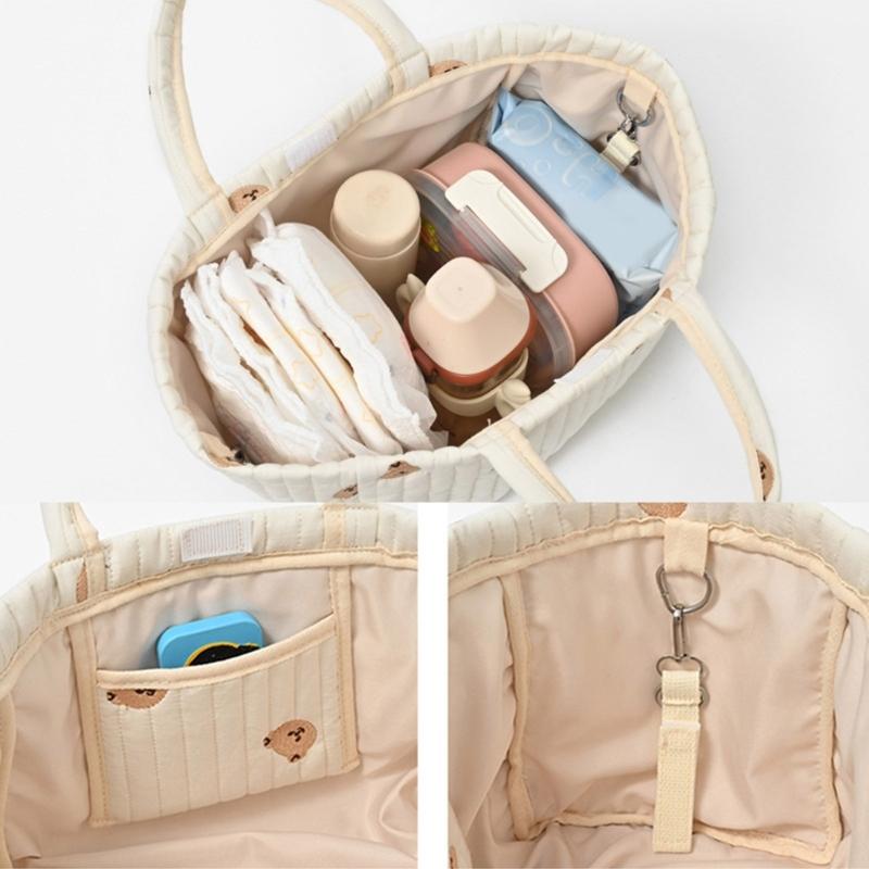 Reisetasche Wickeltasche für Frauen Große Kapazität Stickmuster Handtasche Kinderwagen Hängende Tasche Mama-Tasche
