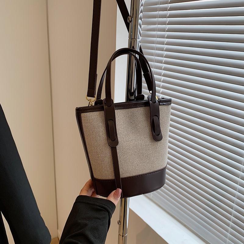 

This year, the popular contrasting color bucket bag women s 2025 new niche fashion portable shoulder bag high-end messenger bag
