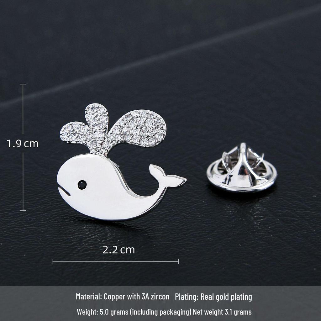 Elegant Gold-Plated Whale Brooch for Women with Zircon Inlay – High-Grade, Niche Lapel Pin with Anti-Exposure Button.