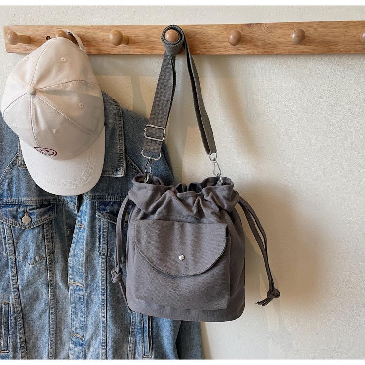 Canvas Bag Women's Spring and Summer New Niche Drawstring Shoulder Messenger Bag Pleated Bucket Bag