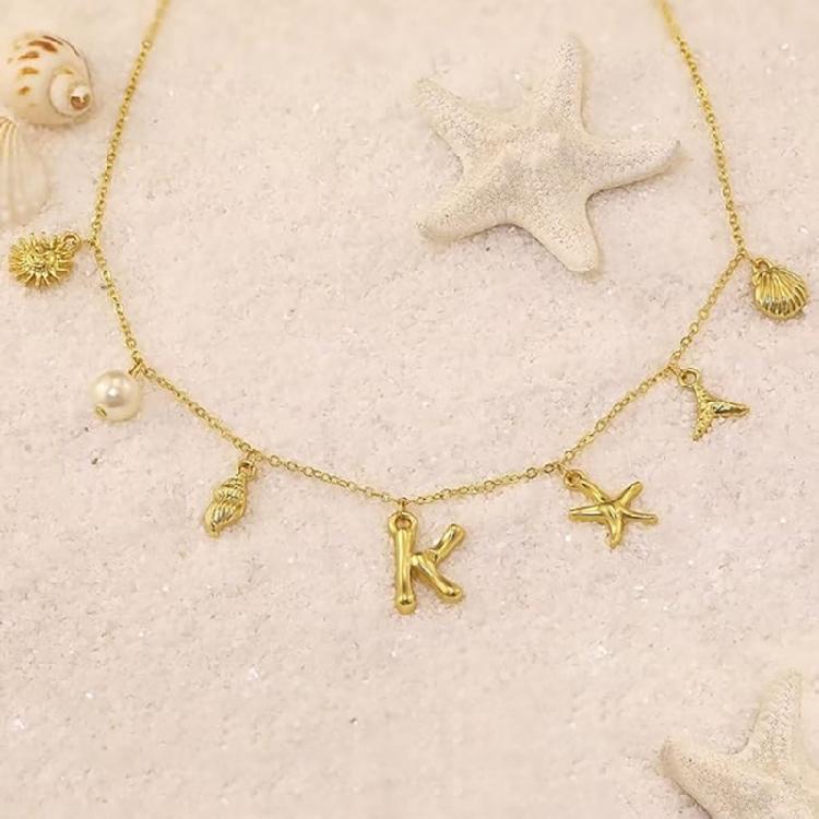 Ocean Theme Gold Charm Necklace with Initial Shells Letter Pendant Suitable for Surfer Girls and Beach Enthusiasts