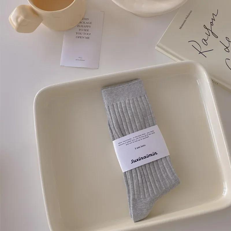 Chaussettes en Tricot de Coton pour Femmes Style Japonais Chaussettes Hautes pour Écolières Mode Coréenne Couleur Unie Noir Blanc Gris Chaussettes Longues