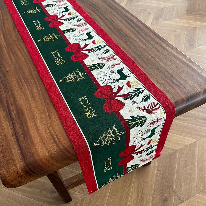 

Праздничная жаккардовая дорожка на стол с рисунком лося и снеговика 35x40 cm
