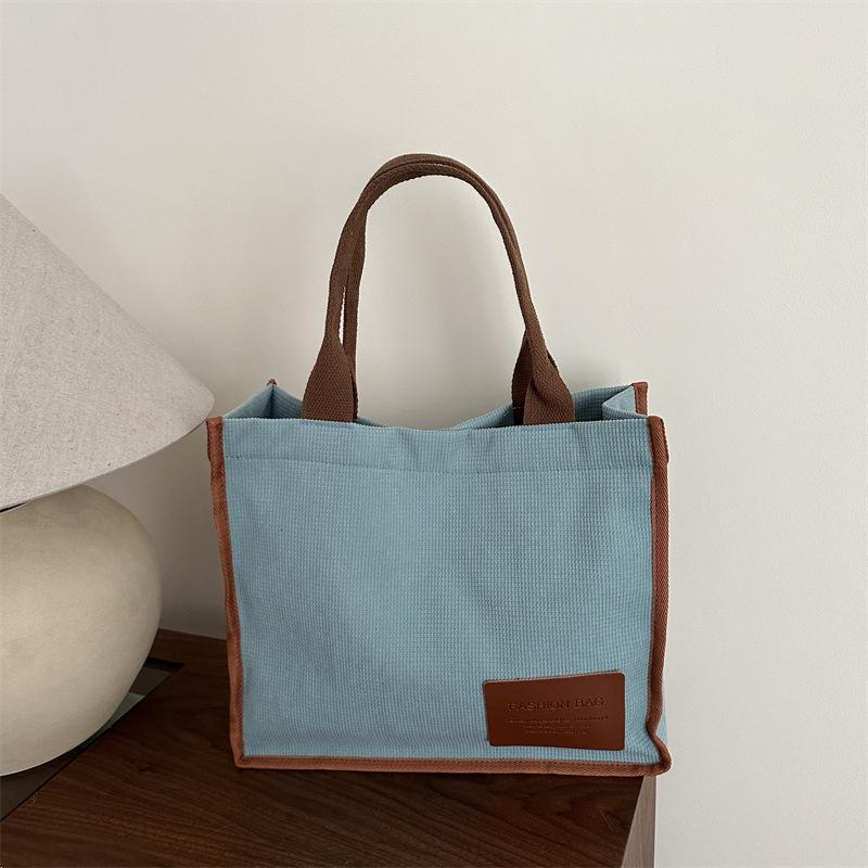 2025 summer new literary and artistic large-capacity class shoulder portable messenger bag casual simple canvas women's bag