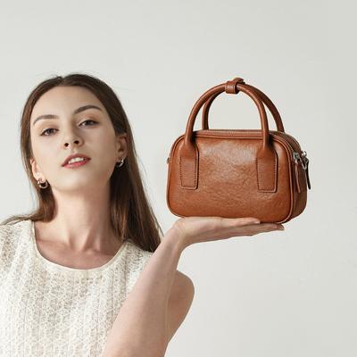 Sac bandoulière unique en cuir véritable pour femme Un sac à main de niche et haut de gamme pour les femmes au bureau