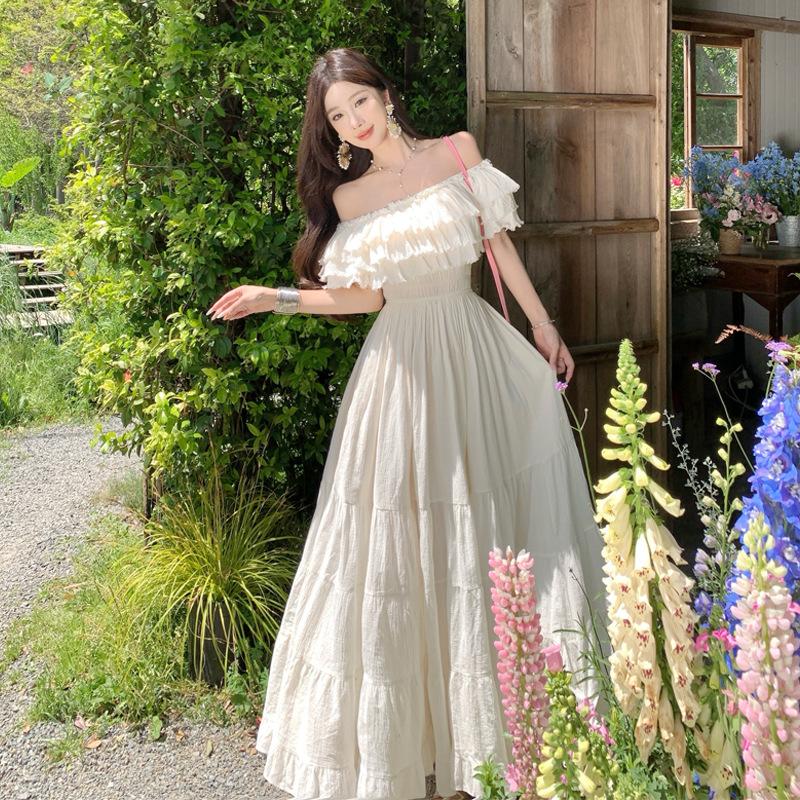 French unique super good-looking one-word shoulder waist dress women's 2026 summer design sense niche big pendulum long skirt