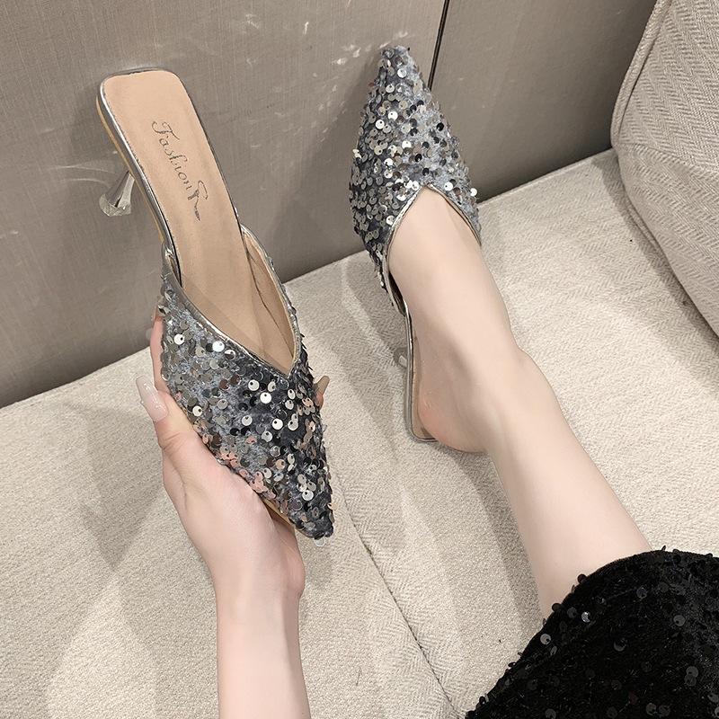 Silver bag head half slippers women's summer wear 2025 niche stiletto pointed sequined back empty high heels with skirt