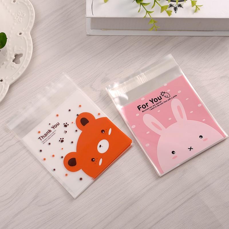 100 Pcs/set Self Adhesive Christmas Santa Cellophane Party Treat Cooky Candy Gift Bags