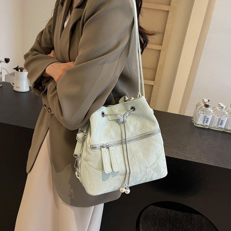 Silver bag women's 2025 new fashion backpack design sense school bag college student shoulder crossbody bucket bag
