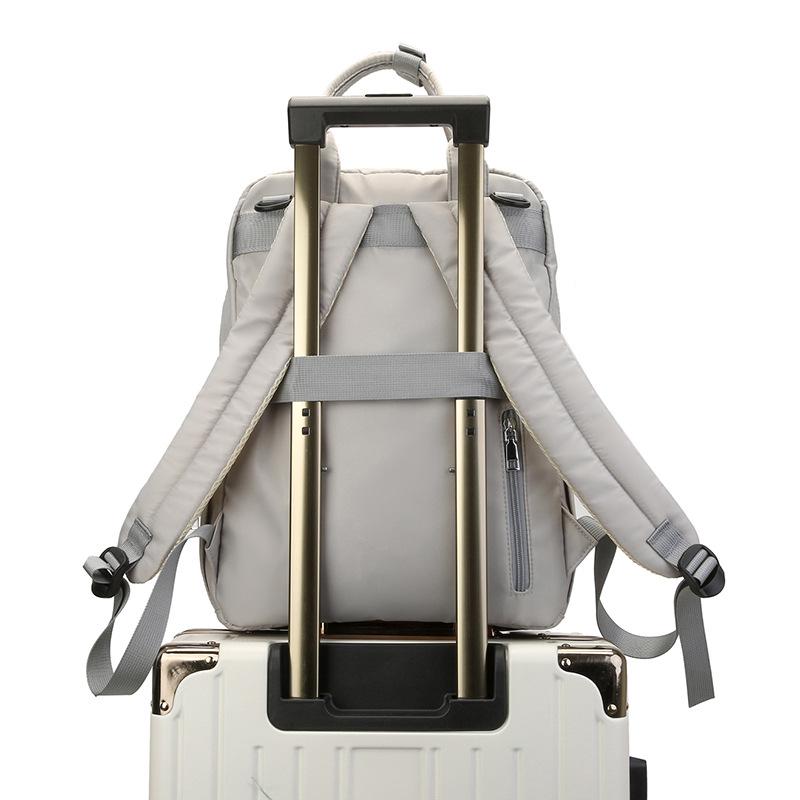 Portable Folding Diaper Bag: Large Capacity Shoulder Bag for Travel, Stroller Hanging, with Baby Bottle Holder and Changing Pad