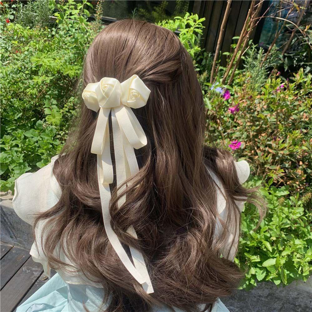 

Головной убор Женские аксессуары для волос Атласный бант Пружинная заколка Камелия Заколка для волос Корейский стиль Заколка для волос