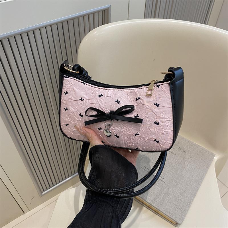 

Fashion casual oblique span bag new niche design bow crescent armpit bag seersucker high value shoulder bag розовый