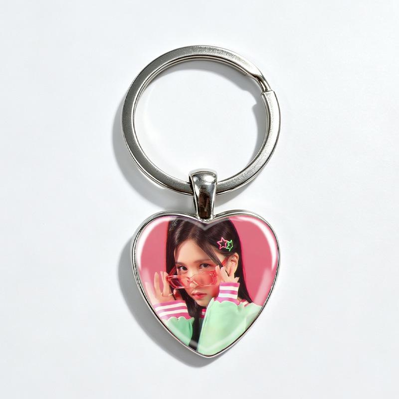 TWICE Heart Keychain - K-pop Star Cartoon Collaboration, Versatile Alloy for Backpack or Car.