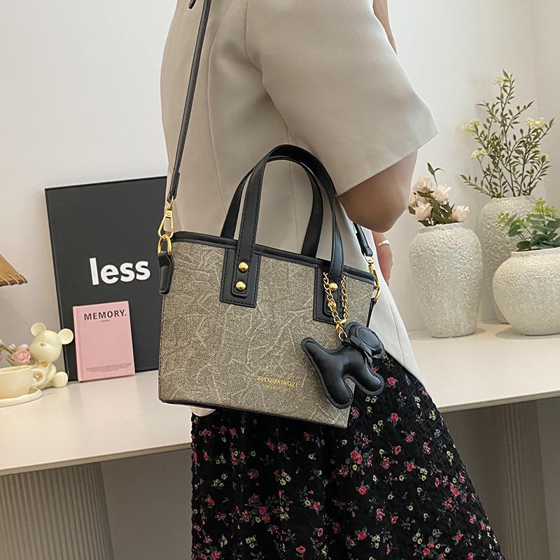 Simple Handbag Bag Women's High-end Sense Versatile Single Shoulder Oblique Span Bag Niche Design Commuter Bucket Bag