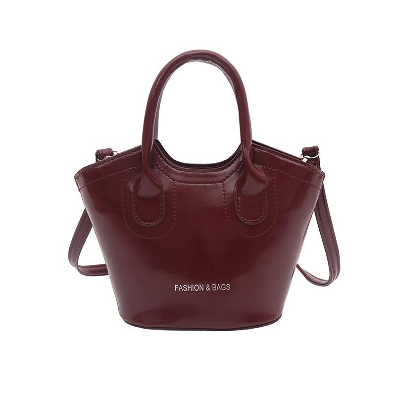 

Niche fashion bucket bag new highend sense versatile handbag simple shoulder messenger bag бордовий