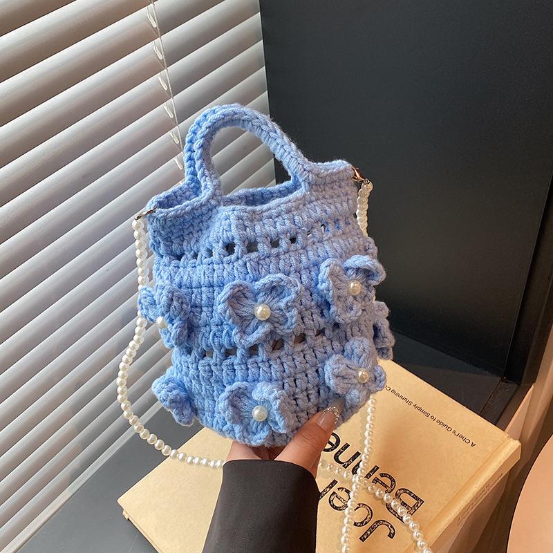 

Literary retro cotton rope hand-woven bag hollow mini handbag women s summer seaside vacation wind messenger bag