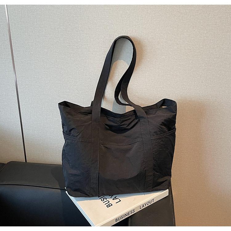 

Simple commuting versatile large-capacity tote bag, high-value commuting shoulder canvas bag when going to work and going out чорний