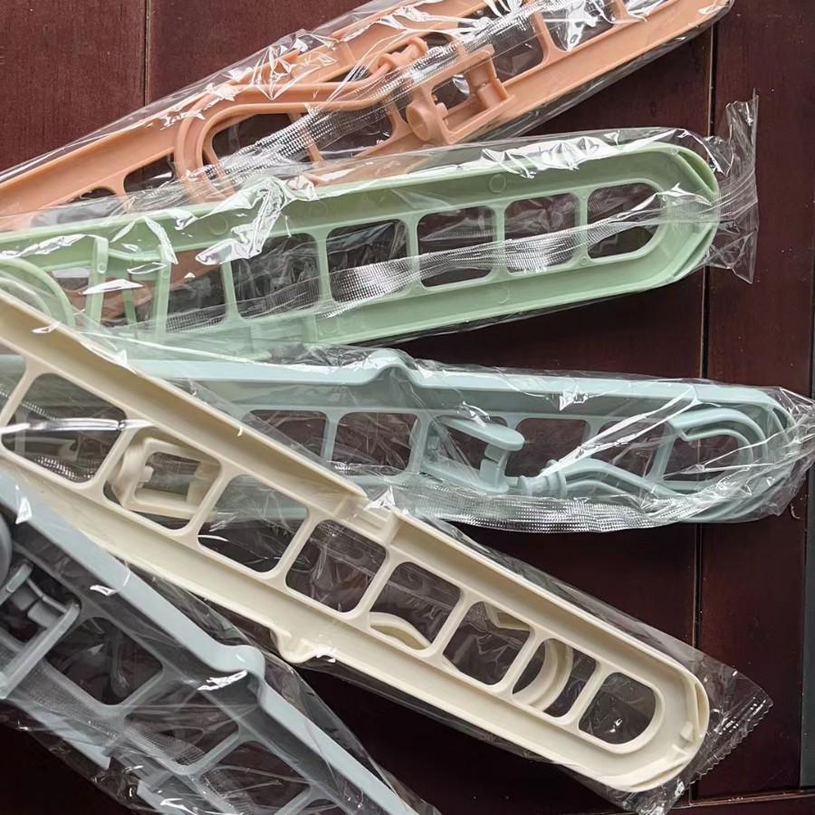 

Багатофункціональна обертова вішалка з 9 отворами для побутового зберігання та організації одягу