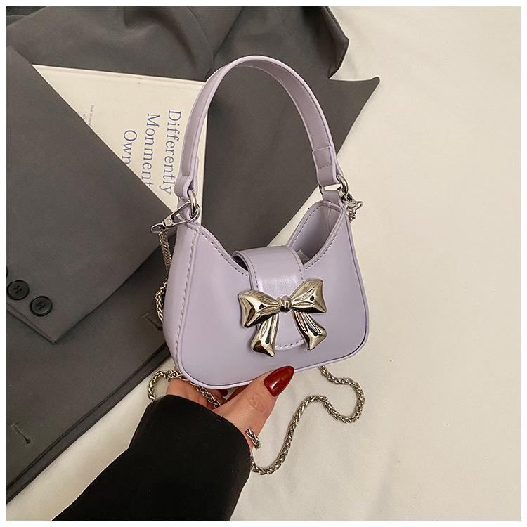 

2025 весна новая трендовая универсальная сумка подмышку зарубежный стиль цепочка маленькая сумка женская бант мини сумка через плечо мессенджер фиолетовый