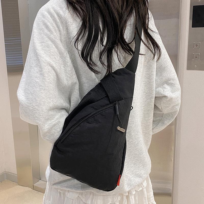 New Japanese simple breast bag couple shoulder messenger bag men's bag large capacity storage bag women