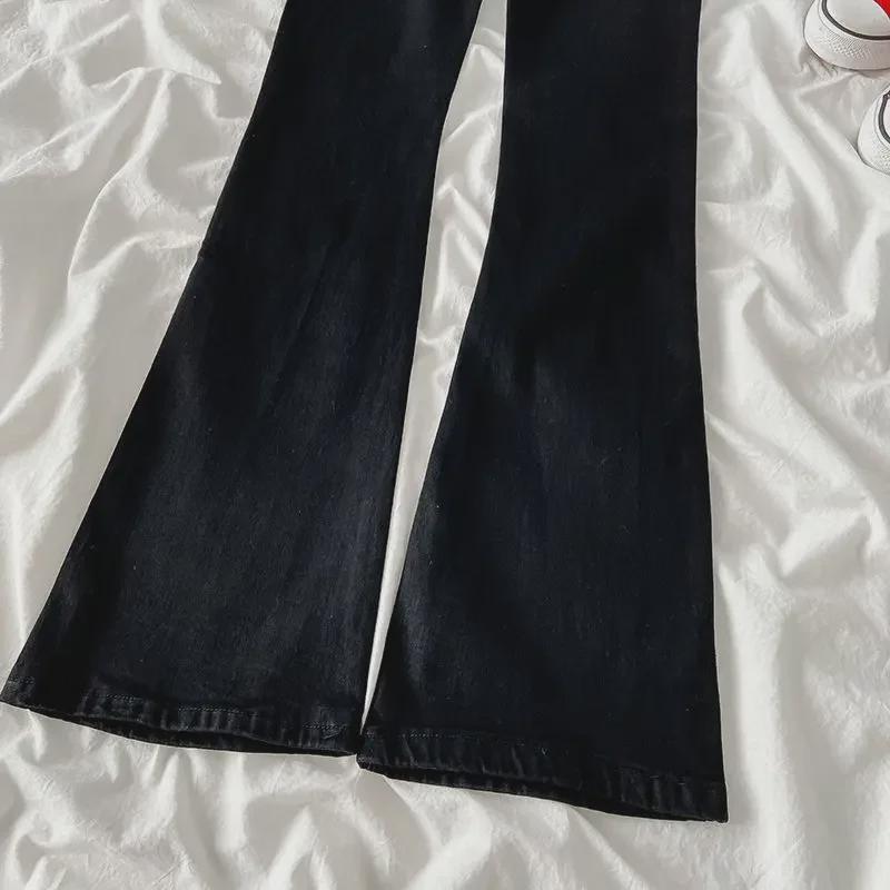 Schwarze Schlagjeans mit hoher Taille für Damen – Slim Fit, elastisch, Herbst/Winter.