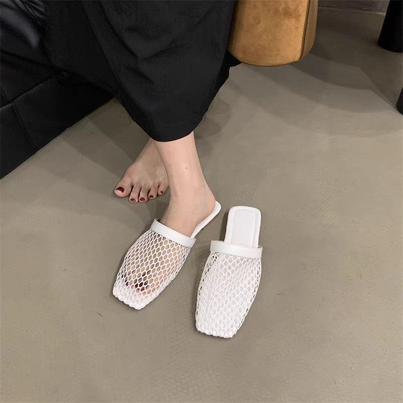 2025 spring and summer new niche woven hollow mesh sandals women European and American fashion flat bottom breathable bag head sandals women