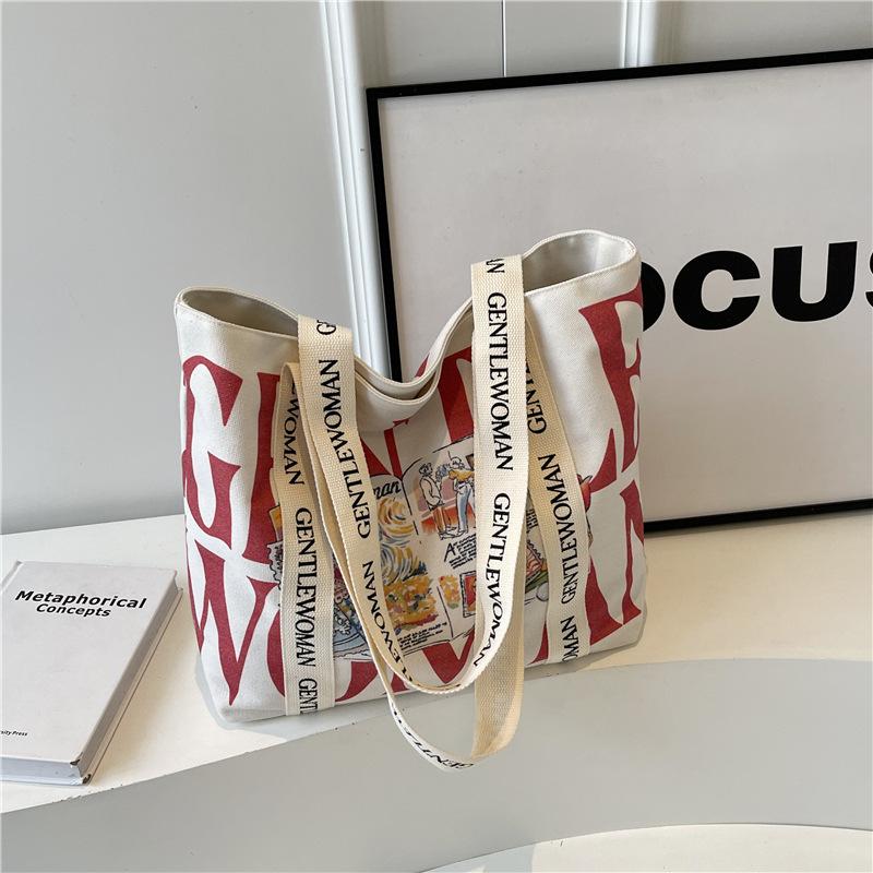 

2025 модная персонализированная холщовая сумка через плечо, трендовая, большой вместимости, с мультяшным принтом в виде букв, женская популярная универсальная сумка-мессенджер