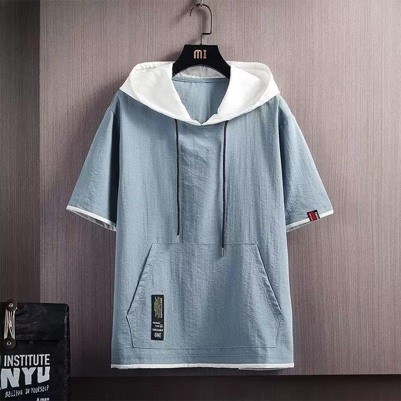 Pánské oversized tričko s kapucí v hongkongském stylu – módní trend léta 2024