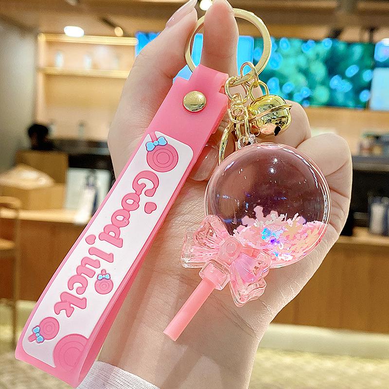 Klíčenka s ozdobou ve tvaru lízátka se sněhovými vločkami a tekutým pískem pro ženy a dívky