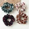 Fresh and Light Floral Fabric Hair Band for Loose Braided Hairstyle in Summer - A Stylish Ponytail Hair Accessory Made of Elastic Band.